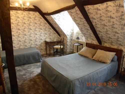 Foto de una habitación de Logis Hôtel Beau Site