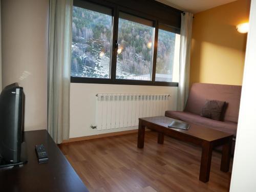 Foto de una habitación de Alquileres Vacacionales La Merceria B - Vacances Pirinenca