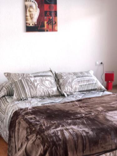 Foto de una habitación de Apartamentos Sant Jordi