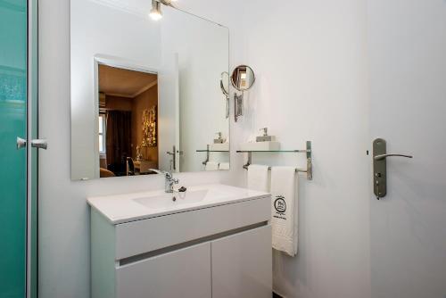 Foto del baño de PH Downtown Suites