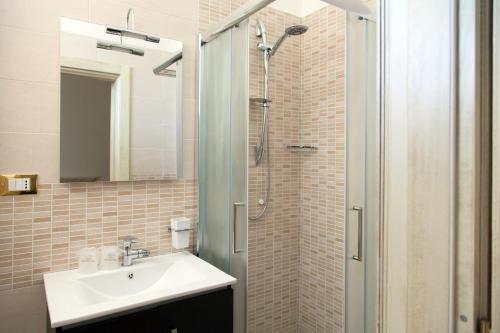 Foto del baño de Hotel City