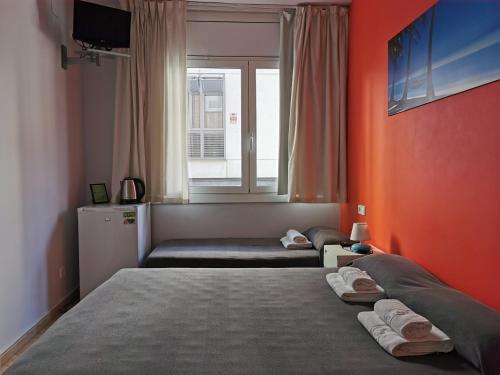 Foto de una habitación de Barcelona City North Hostal