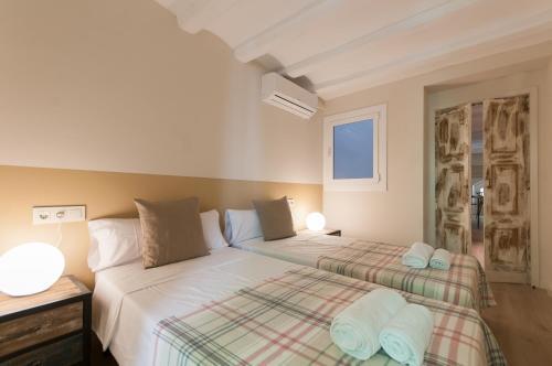 Foto de una habitación de Apartamentos Weflating Suites Sant Antoni Market