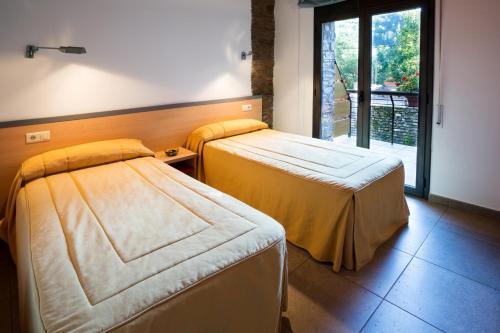 Foto de una habitación de Hotel Allotjament Rural Cal Miquel