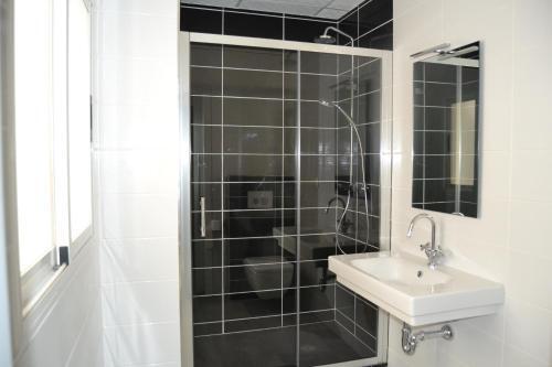 Foto del baño de Apartamentos Luces de Catedral