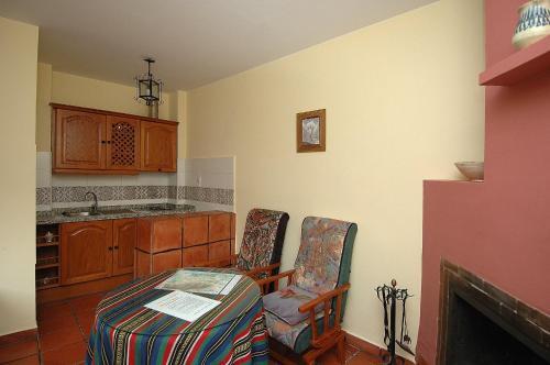 Foto de una habitación de Apartamentos Turísticos Rural Los Tinaos