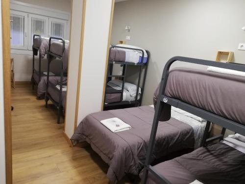 Foto de una habitación de Albergue Camiño Real Sigüeiro Apart