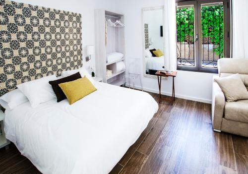 Foto de una habitación de Fuente Torán Apartamentos