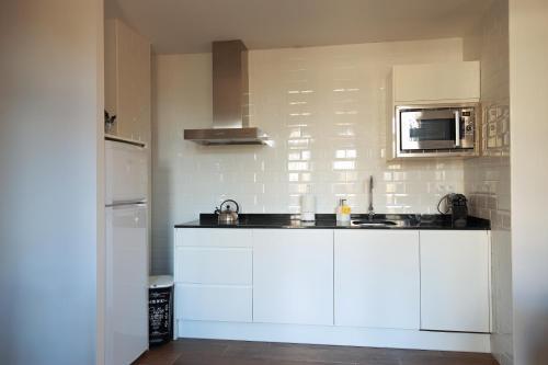 Foto de una habitación de Fuente Torán Apartamentos