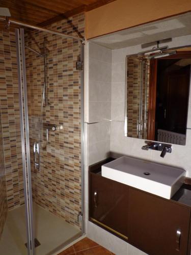 Foto del baño de Aqua Rooms Sarria