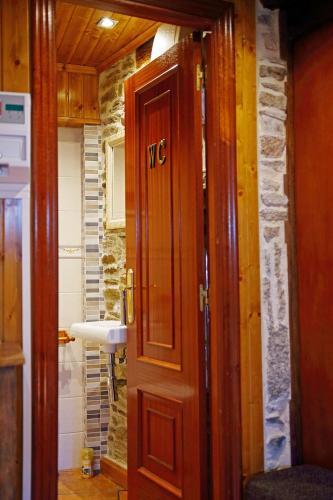 Foto del baño de Aqua Rooms Sarria