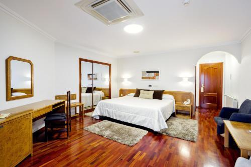Foto de una habitación de Hotel As Camelias