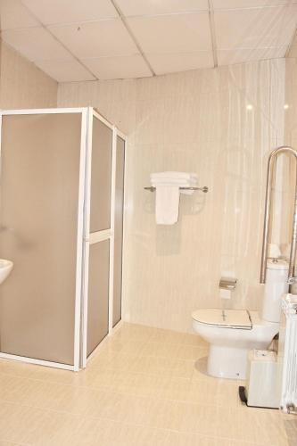 Foto del baño de Hotel As Camelias