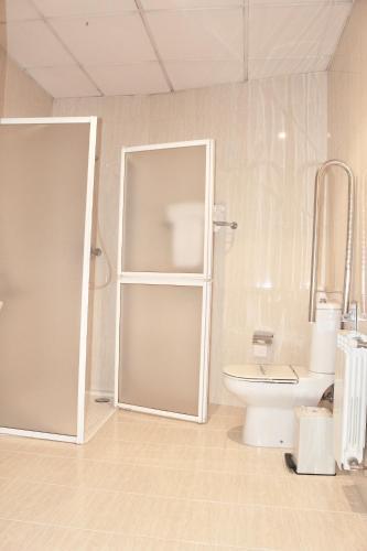 Foto del baño de Hotel As Camelias