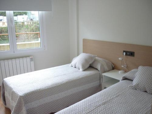 Foto de una habitación de Pensión-Albergue Puente Ribeira