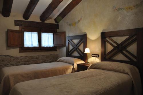 Foto de una habitación de Apartamentos Turismo Rural Casa Purroy