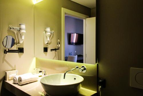 Foto del baño de Avenida Boutique Hotel