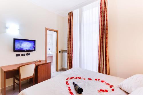 Foto de una habitación de Hotel Suite Caesar
