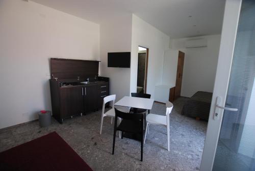 Foto de una habitación de Hotel Torre Santamaria Resort