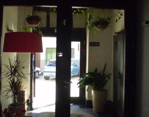 Foto de una habitación de Apartamentos La Plaza