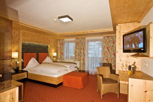 Foto de una habitación de Landhotel Alpenhof Filzmoos