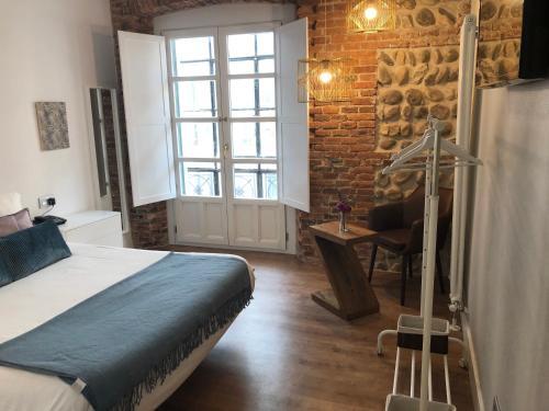 Foto de una habitación de Hostal Albany Ancha