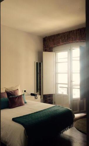 Foto de una habitación de Hostal Albany Ancha