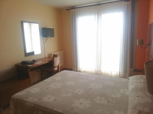 Foto de una habitación de Hotel A Raiña