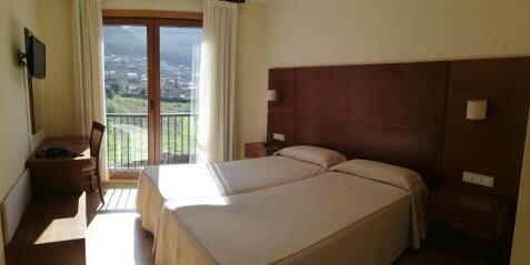 Foto de una habitación de Hotel A Raiña
