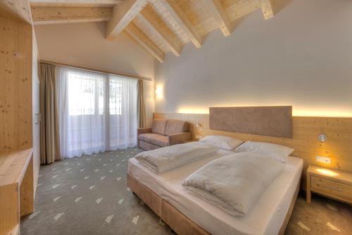 Foto de una habitación de Hotel Rezia