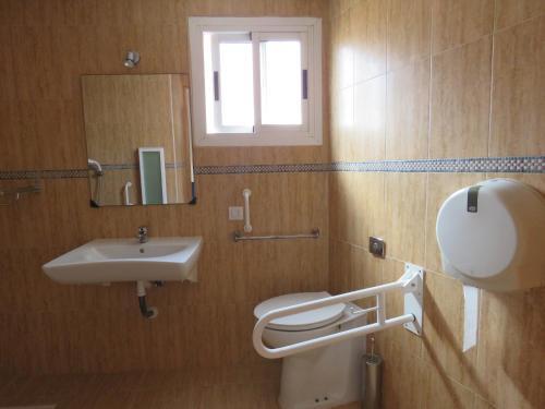 Foto del baño de Hotel Alain