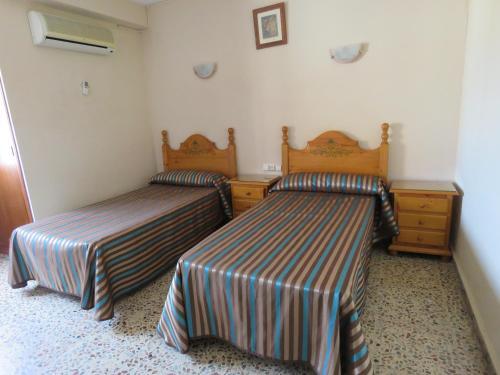 Foto de una habitación de Hotel Alain