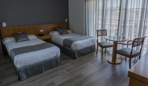 Foto de una habitación de Hotel Nueva Colina