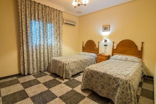 Foto de una habitación de Santa Ana Hostal