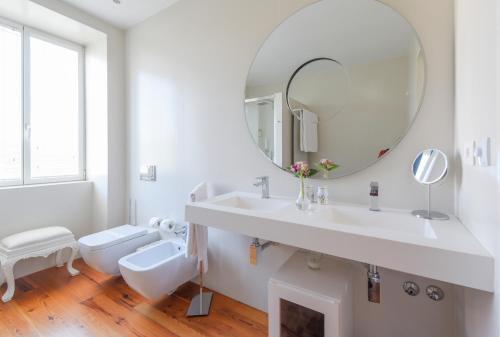 Foto del baño de Hotel Sundial Gardens &amp;amp; Suites