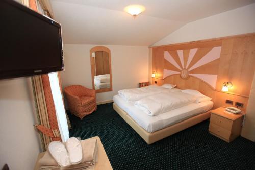 Foto de una habitación de Renè Dolomites Boutique Hotel