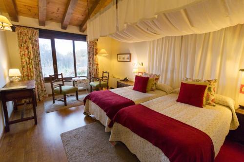 Foto de una habitación de Hotel Llano Tineo