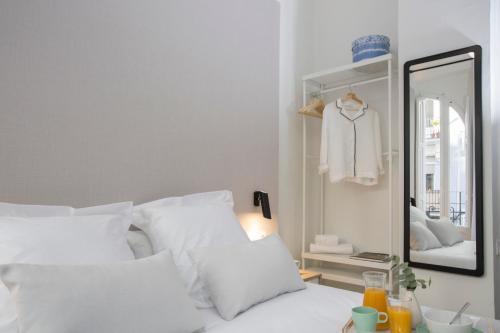 Foto de una habitación de Apartamentos SingularStays Parque Central