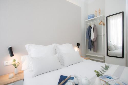 Foto de una habitación de Apartamentos SingularStays Parque Central