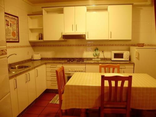 Foto de una habitación de Escuder Apartamentos Turísticos