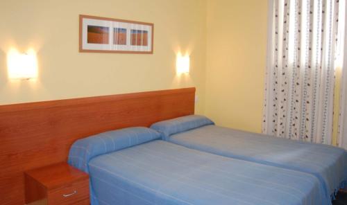 Foto de una habitación de Hostal Los Claveles