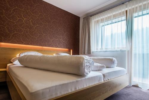 Foto de una habitación de Aparthotel Tschanun Garni