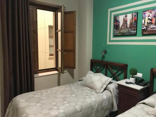 Foto de una habitación de Hostal Puerta Carmona