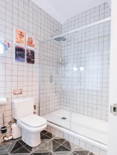 Foto del baño de Pensión Boutique Caravan Cinema