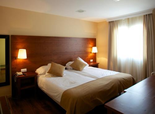 Foto de una habitación de Hotel del Carme
