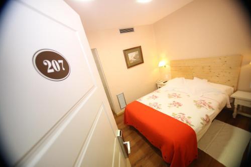 Foto de una habitación de Hotel del Carme
