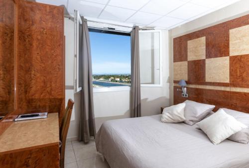 Foto de una habitación de Hotel Le Richmont