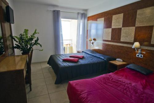 Foto de una habitación de Hotel Le Richmont