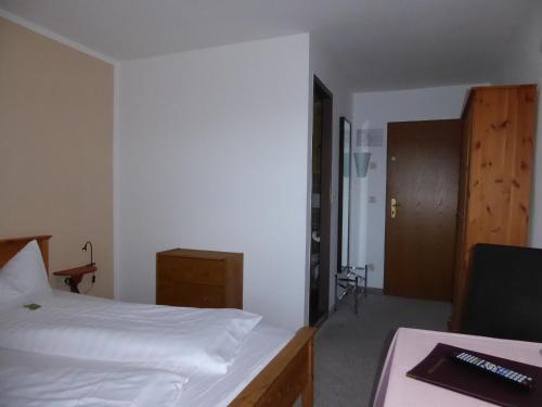 Foto de una habitación de Hotel Garni Post