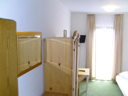 Foto de una habitación de Hotel Garni Post